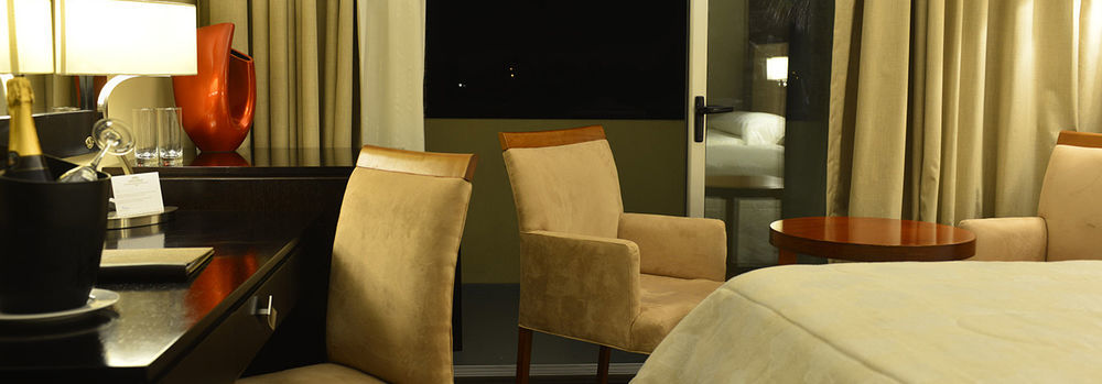 Howard Johnson Plaza Resort Lujan  Bagian luar foto